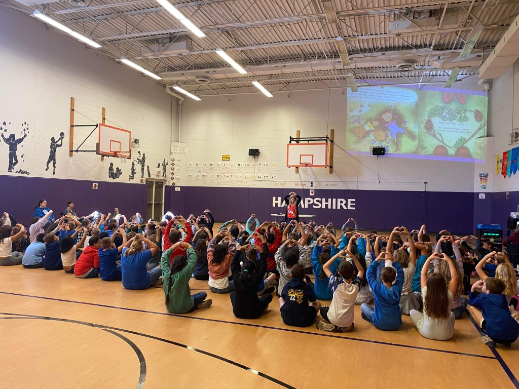 Laura Roettiger Author Visit at Hampshire Elementary Students are showing what Aliana made for Mamá